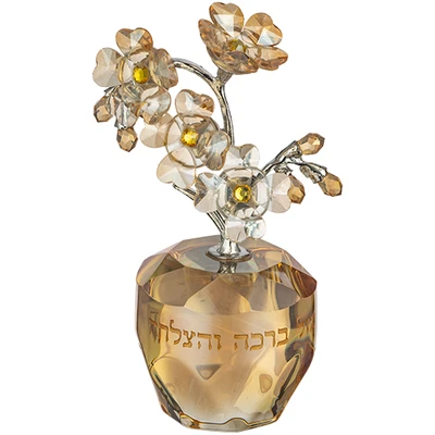 עץ קריסטל עם פרחים בגוון ענבר זהוב על בסיס מלוטש וכיתוב "ברכה והצלחה" › דברי שיר